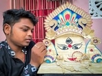 An artist named Biswajeet Nayak makes Maa Durga's face using a total of 275 ice cream sticks on the occasion of Maha Ashtami, in Puri.(ANI) An artist named Biswajeet Nayak makes Maa Durga's face using a total of 275 ice cream sticks on the occasion of Maha Ashtami, in Puri.(ANI)