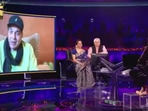 Dharmendra joins KBC 13 via video call