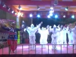 A video showed a group of girls dancing 'garba' to a folk song in PPE kits(ANI) A video showed a group of girls dancing 'garba' to a folk song in PPE kits(ANI)