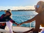 Priyanka Chopra holds mother Madhu Chopra's hand as she enjoys her day out in Spain.(Instagram)