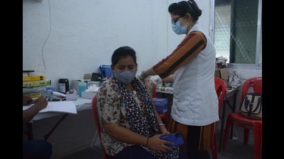 A beneficiary gets vaccination against Covid in Thane on Wednesday. (PRAFUL GANGURDE/HT PHOTO)