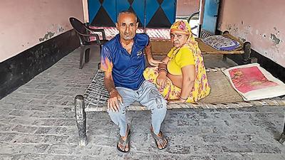 Brajesh Tyagi and his wife at their Ghaziabad home (HT Photo) Brajesh Tyagi and his wife at their Ghaziabad home (HT Photo)