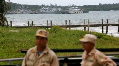 FILE PHOTO: Sailors stand guard at the Cambodian Ream Naval Base in Sihanoukville, Cambodia, July 26, 2019.&nbsp; (REUTERS/Samrang Pring)