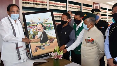Vice President M Venkaiah Naidu receives an artwork from the speaker of Arunachal Pradesh Assembly Pasang Dorjee Sona, depicting Naidu in Memba traditional attire, on Saturday. (PTI) Vice President M Venkaiah Naidu receives an artwork from the speaker of Arunachal Pradesh Assembly Pasang Dorjee Sona, depicting Naidu in Memba traditional attire, on Saturday. (PTI)