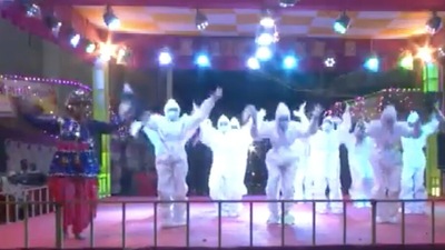 A video showed a group of girls dancing 'garba' to a folk song in PPE kits (ANI) A video showed a group of girls dancing 'garba' to a folk song in PPE kits (ANI)