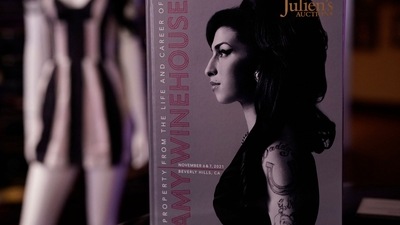 Amy Winehouse's belongings, including her final concert short dress, are up for auction (AFP) Amy Winehouse's belongings, including her final concert short dress, are up for auction (AFP)