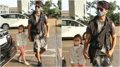 Shahid rounded off his outfit with a black sleeveless jacket, an over-the-body bag, sunglasses, and chunky black sneakers. As for the couple's kids, they looked adorable as ever. (HT Photo/Varinder Chawla) Shahid rounded off his outfit with a black sleeveless jacket, an over-the-body bag, sunglasses, and chunky black sneakers. As for the couple's kids, they looked adorable as ever. (HT Photo/Varinder Chawla)