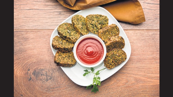 Cilantro cake or Kothimbir Vadi is a popular Maharashtrian cuisine. (Shutterstock) Cilantro cake or Kothimbir Vadi is a popular Maharashtrian cuisine. (Shutterstock)