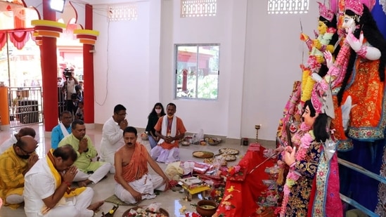 Assam Chief Minister Himanta Biswa Sarma offers prayers to Goddess Durga on the occasion of Maha Saptami during the Durga Puja celebration, at Silchar, in Cachar on October 12.(ANI)