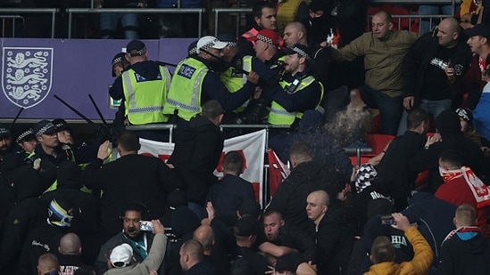 Fans of Hungary clash with police during the 2022 FIFA World Cup Qualifier match. (Getty) Fans of Hungary clash with police during the 2022 FIFA World Cup Qualifier match. (Getty)
