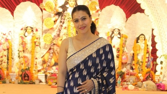 Kajol wore a blue saree on the occasion.