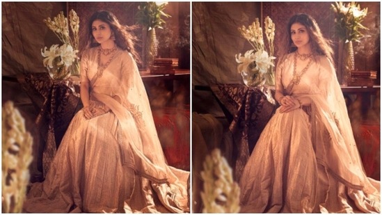 Earlier, Mouni Roy made headlines when she posed in a stunning golden lehenga for Jodaa promotions. (Instagram/@imouniroy)