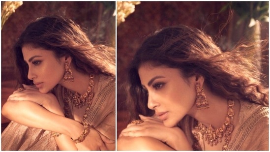 Mouni Roy redefined royalty and elegance as she styled herself in a golden lehenga.(Instagram/@imouniroy)