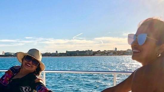Priyanka Chopra holds mother Madhu Chopra's hand as she enjoys her day out in Spain.(Instagram)
