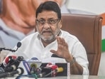 Nawab Malik, minority affairs minister of Maharashtra, addresses a press conference in Mumbai, on Thursday, Oct. 14, 2021. (PTI) Nawab Malik, minority affairs minister of Maharashtra, addresses a press conference in Mumbai, on Thursday, Oct. 14, 2021. (PTI)
