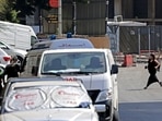 A woman crosses a road towards Lebanese medics during clashes in the area of Tayouneh, in the southern suburb of the capital Beirut. A woman crosses a road towards Lebanese medics during clashes in the area of Tayouneh, in the southern suburb of the capital Beirut.