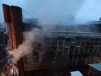 Smoke from an overnight fire rises from a building in the southern Taiwanese city of Kaohsiung on October 14, 2021. Smoke from an overnight fire rises from a building in the southern Taiwanese city of Kaohsiung on October 14, 2021.