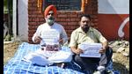 BJP leaders stage a protest against LIT decision to change the name of Atal Apartments scheme to Sahir Ludhianvi Apartments at Karnail Singh Nagar in Ludhiana on Thursday. (Harsimar Pal Singh/HT) BJP leaders stage a protest against LIT decision to change the name of Atal Apartments scheme to Sahir Ludhianvi Apartments at Karnail Singh Nagar in Ludhiana on Thursday. (Harsimar Pal Singh/HT)