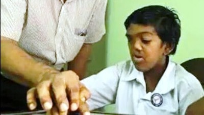 A special educator guiding a CWsN. ((For Representation only)) A special educator guiding a CWsN. ((For Representation only))