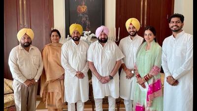 Punjab CM Charanjit Singh Channi was accompanied by his newlywed son Navjit Singh and daughter-in-law Simrandheer Kaur, who took blessings from Capt Amarinder Singh. (HT Photo)