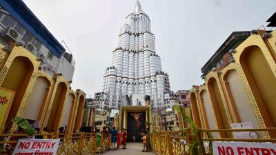 The Sreebhumi Sporting Club puja pandal was built resembling the Burj Khalifa skyscraper in Dubai and had become a major crowd puller this year during Durga Puja. (PTI PHOTO.) The Sreebhumi Sporting Club puja pandal was built resembling the Burj Khalifa skyscraper in Dubai and had become a major crowd puller this year during Durga Puja. (PTI PHOTO.)