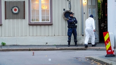 Police near a site after a man killed several people, in Kongsberg, Norway, Thursday, Oct. 14, 2021.&nbsp; (AP)