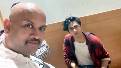 The man took a selfie with Aryan Khan after he was arrested by the NCB on October 3. (ANI FIle Photo) The man took a selfie with Aryan Khan after he was arrested by the NCB on October 3. (ANI FIle Photo)