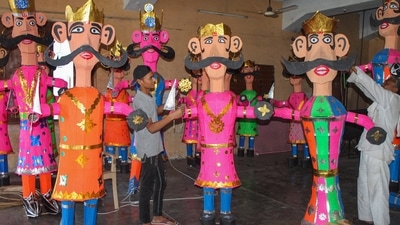 Artisans prepare the effigies of Ravana, Kumbhakarna and Meghnath ahead of Dussehra, in Faridabad. (PTI) Artisans prepare the effigies of Ravana, Kumbhakarna and Meghnath ahead of Dussehra, in Faridabad. (PTI)