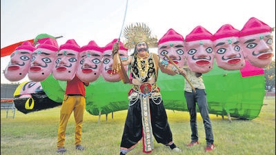 An actor gestures as he plays the part of Ravana during a Ramlila performance at the Parade Ground in Sector 17, Chandigarh, on Thursday. (Ravi Kumar/HT) An actor gestures as he plays the part of Ravana during a Ramlila performance at the Parade Ground in Sector 17, Chandigarh, on Thursday. (Ravi Kumar/HT)