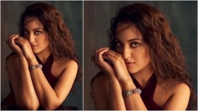 Sonakshi Sinha looks to-die-for in this maroon halter dress. She accessorised her look with a bracelet. (Instagram/@aslisona)