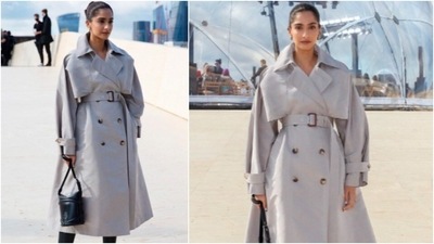 Sonam Kapoor teamed her look with black boots and accessorised it with a small black bag and earrings. (Instagram/@sonamkapoor) Sonam Kapoor teamed her look with black boots and accessorised it with a small black bag and earrings. (Instagram/@sonamkapoor)