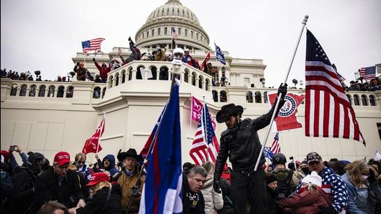 Despite Donald Trump’s refusal to acknowledge defeat in the 2020 election, the failed insurrection at the Capitol on January 6, the US remains a mature democracy on the right side of the curve (AFP)