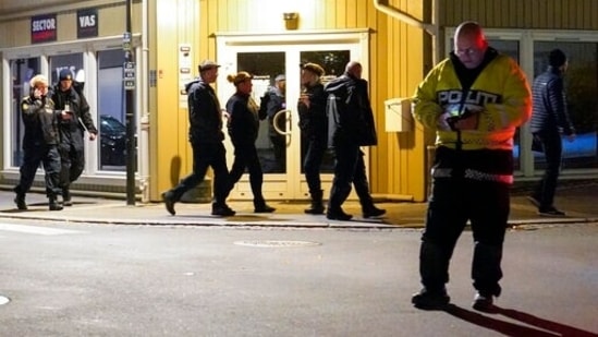 Police work at the scene where an arrow was shot into a wall in Kongsberg, Norway, Wednesday, Oct. 13, 2021. A man armed with a bow and arrows killed several people Wednesday near the Norwegian capital of Oslo before he was arrested, authorities said. (AP) Police work at the scene where an arrow was shot into a wall in Kongsberg, Norway, Wednesday, Oct. 13, 2021. A man armed with a bow and arrows killed several people Wednesday near the Norwegian capital of Oslo before he was arrested, authorities said. (AP)
