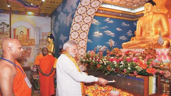 Prime Minister Narendra Modi praying before Lord Buddha at Bodh Gaya.(AFP File Photo)