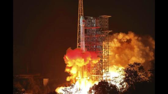 In this December 8, 2018, file photo released by Xinhua News Agency, the Chang'e 4 lunar probe launches from the Xichang Satellite Launch Center in southwest China's Sichuan Province. (AP) In this December 8, 2018, file photo released by Xinhua News Agency, the Chang'e 4 lunar probe launches from the Xichang Satellite Launch Center in southwest China's Sichuan Province. (AP)
