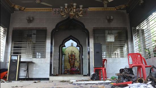 A vandalise temple is seen in Comilla on October 14, after hundreds vandalised several Hindu temples across the Muslim-majority country following furore over footage of a Quran being placed on the knee of god Hanuman during a religious festival. (AFP)