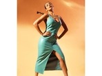 Malaika Arora styles <span class='webrupee'>₹</span>20k bold front slit teal leather dress with bubble braid Malaika Arora styles <span class='webrupee'>₹</span>20k bold front slit teal leather dress with bubble braid