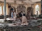 People view the damage inside of a mosque following a bombing in Kunduz, province northern Afghanistan, on Friday, October. 8, 2021(AP) People view the damage inside of a mosque following a bombing in Kunduz, province northern Afghanistan, on Friday, October. 8, 2021(AP)