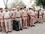 Police personnel at the Singhu border site where a 32-year-old man was found tied to a barricade on Friday.&nbsp;