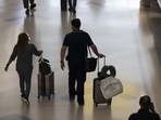 The Nov. 8 date applies to a change in air travel rules, as well as an opening along land borders with Canada and Mexico announced earlier this week.(Bloomberg) The Nov. 8 date applies to a change in air travel rules, as well as an opening along land borders with Canada and Mexico announced earlier this week.(Bloomberg)
