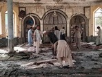 People view the damage inside of a mosque following a bombing in Kunduz, province northern Afghanistan, on Friday, October. 8, 2021. (AP) People view the damage inside of a mosque following a bombing in Kunduz, province northern Afghanistan, on Friday, October. 8, 2021. (AP)