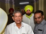 Punjab Pradesh Congress Committee chief Navjot Singh Sidhu with Congress's Punjab in-charge Harish Rawat after a meeting in New Delhi.(PTI) Punjab Pradesh Congress Committee chief Navjot Singh Sidhu with Congress's Punjab in-charge Harish Rawat after a meeting in New Delhi.(PTI)