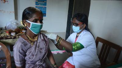 A beneficiary being vaccinated at CR Wadia Hospital in Thane, Mumbai. (HT Photo)