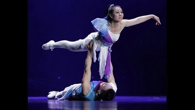 Born to Perform: Part of a four-year-old and ongoing photo project shot in India and aboard with performing artists from 20 countries. Chinese ballet dancer Ma Li has one arm while Zhai Xiaowei has one leg but together they have performed all over the world. (Photo: Vijay S Jodha) Born to Perform: Part of a four-year-old and ongoing photo project shot in India and aboard with performing artists from 20 countries. Chinese ballet dancer Ma Li has one arm while Zhai Xiaowei has one leg but together they have performed all over the world. (Photo: Vijay S Jodha)