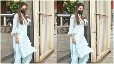 Malaika pair a soft blue kurta with a sharara set of the same print. She teamed it with white juttis. (HT Photos/Varinder Chawla) Malaika pair a soft blue kurta with a sharara set of the same print. She teamed it with white juttis. (HT Photos/Varinder Chawla)