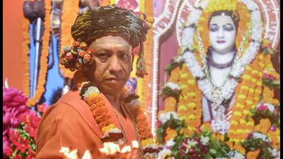 Uttar Pradesh CM Yogi Adityanath performs rituals inside a temple on the occasion of Dussehra festival in Gorakhpur, Friday, (PTI Photo)