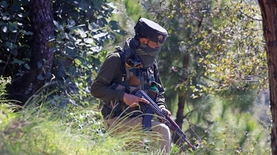 Security personnel patrols near an ecnounter site (ANI)