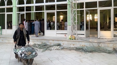 People view the damage inside of a mosque following a suicide bombers attack in the city of Kandahar, southwest Afghanistan (AP) People view the damage inside of a mosque following a suicide bombers attack in the city of Kandahar, southwest Afghanistan (AP)