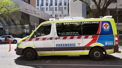 An ambulance drives past the Royal Melbourne Hospital in Melbourne (AFP) An ambulance drives past the Royal Melbourne Hospital in Melbourne (AFP)