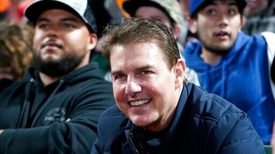 Tom Cruise smiles during Game 2 of a baseball National League Division Series between the San Francisco Giants and the Los Angeles Dodgers Saturday in San Francisco. (AP Photo/Jeff Chiu) (AP) Tom Cruise smiles during Game 2 of a baseball National League Division Series between the San Francisco Giants and the Los Angeles Dodgers Saturday in San Francisco. (AP Photo/Jeff Chiu) (AP)